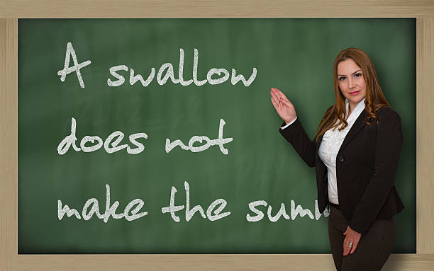 istock Teacher showing A swallow does not make the summer 179263601
