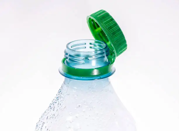 Photo of Plastic bottle with tethered cap