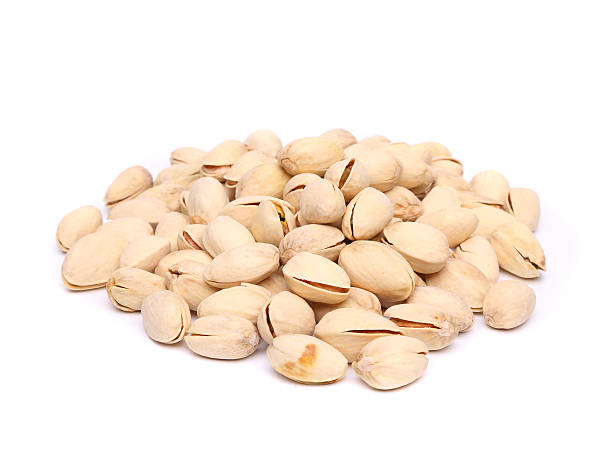 istock pistachios heap on the white background 179264004