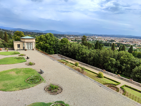 Paris, France - May, 2022:  Gardens of the famous Palace of Versailles. whole site have unique fountains, ponds, lake and landscapes built in 17th c.