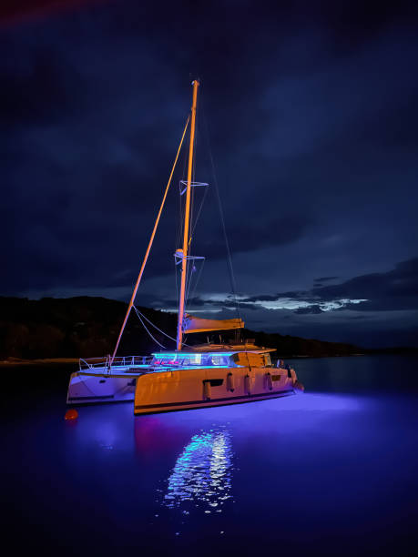 istock Anchored catamaran at dusk 1792648606