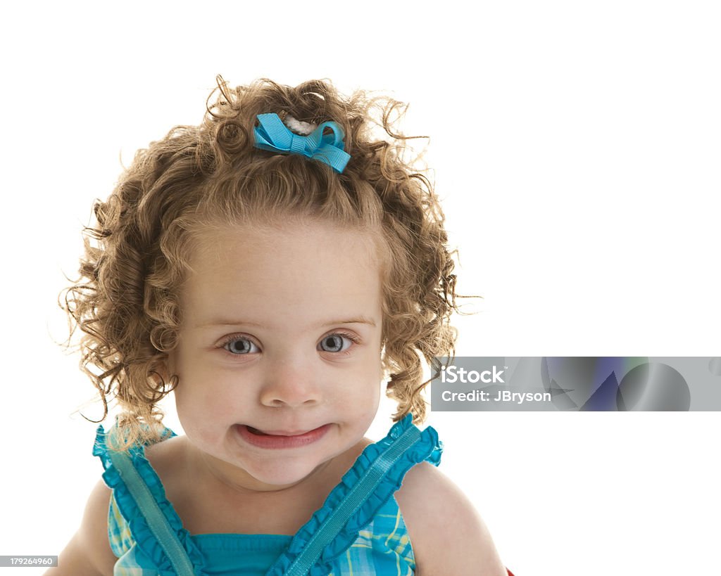 One Year Old Baby Girl with Blue Eyes Curly Hair One Year Old Mixed Race Baby Girl with Blue Eyes Curly Hair. Hair Bow Stock Photo