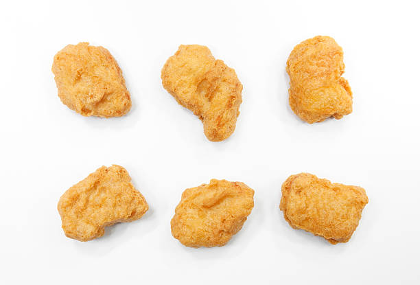 chicken nuggets on white background chicken nuggets on white background, isolated nugget photos stock pictures, royalty-free photos & images