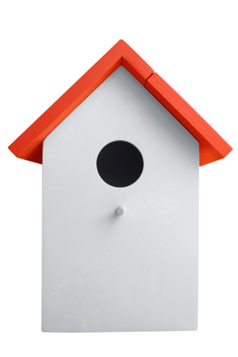 White nest box birdhouse isolated on white. Clipping path included..