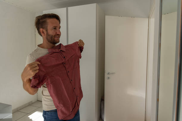 istock Deciding what shirt to wear 1792652359