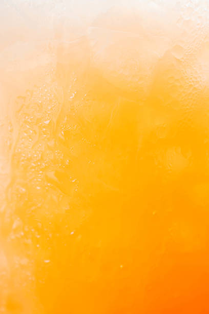 Natural gradient of iced orange juice and drops