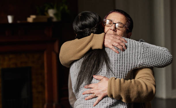 Hope, support hug and women counseling for healing and mental health problem. Empathy, psychology workshop and therapy session help together in solidarity for team building with care or forgive Hope, support group hug and women counseling for healing and mental health problem. Empathy, psychology workshop and therapy session together in a circle for team building with care and faith mercy hug stock pictures, royalty-free photos & images