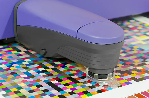 istock icc profiling, spectrophotometer robot measures color patches on Test Arch 179266300