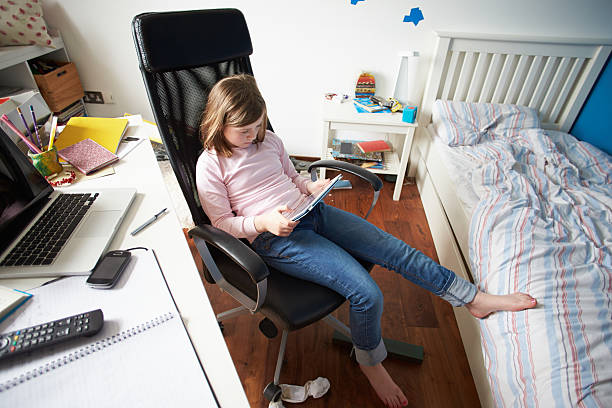 istock Girl Using Digital Tablet In Bedroom 179266440