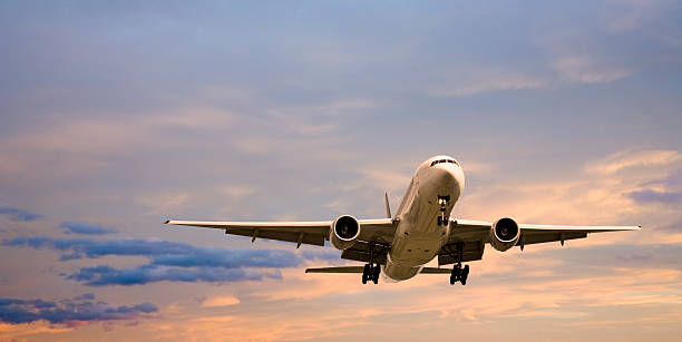 istock Jet Aeroplane Landing at Sunset 179267392