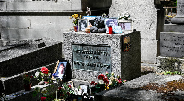 At the quaint and historic Pere Lachaise cemetery, shoot of the grave of legendary singer Jim Morrison who died at the young age of 27.
