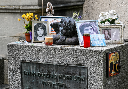At the quaint and historic Pere Lachaise cemetery, shoot of the grave of legendary singer Jim Morrison who died at the young age of 27.