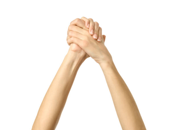 istock Clasped hands. Woman hand gesturing isolated on white 1792681470