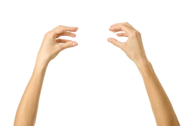 istock Holding or measuring hands. Woman hand gesturing isolated on white 1792682268