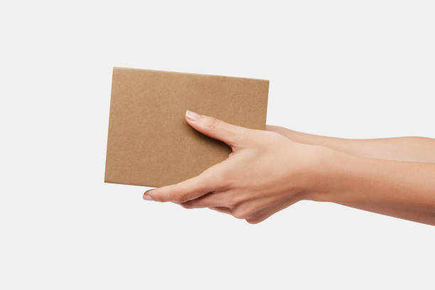 istock Hands delivering a carton box 1792682646