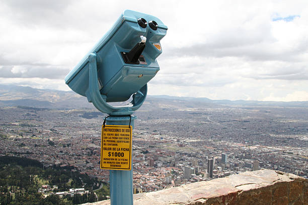 Telescope with panoramic view on big city stock photo