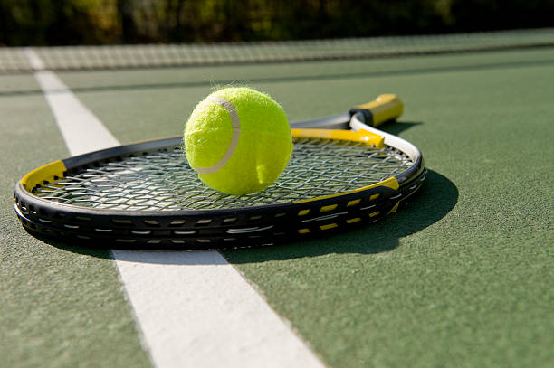 istock Tennis Racket and ball on white 179269216
