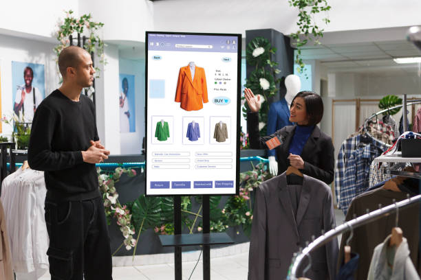 istock Employee showcasing clothing items 1792694314