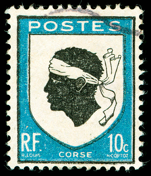 vintage postage stamp with corsica national emblem stock photo