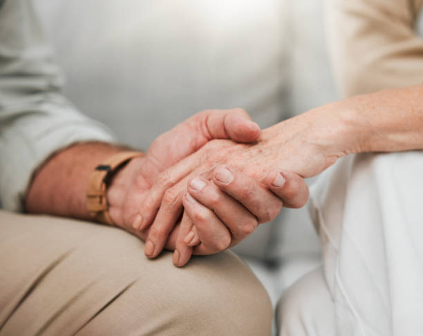 istock Empathy, love or old couple holding hands to support each other in marriage commitment or retirement with trust. Gratitude, zoom or elderly woman comforting a senior lover with sympathy or solidarity 1792694906