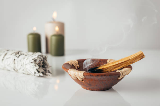 istock Palo santo burning stick with white sage and tarot deck 1792705861