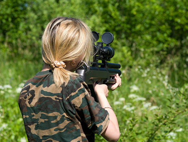 istock The blonde with a gun. 179271605