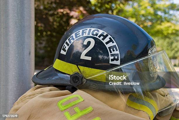 Firefighters Helmet Stock Photo - Download Image Now - Black Color, Clothing, Coat - Garment
