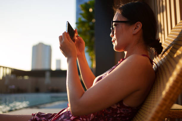 istock A woman using a smartphone 1792736416