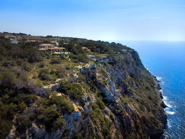 istock Mallorca shore, cliffs and rocky beach, beautiful blue sea 1792748351
