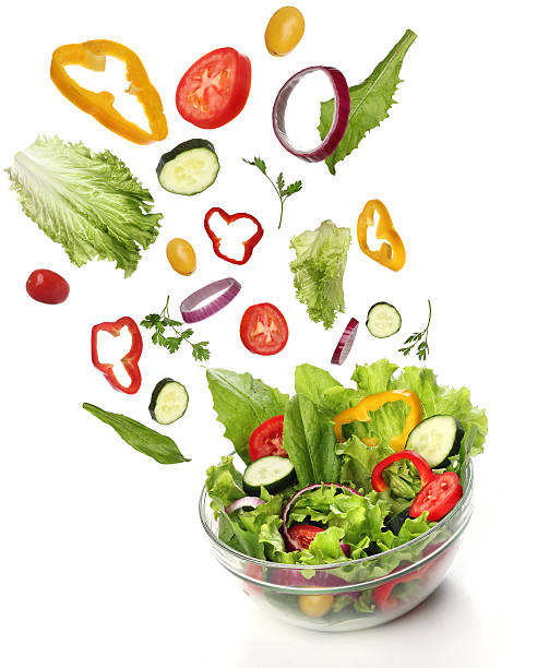 istock Falling fresh vegetables. Healthy salad isolated 179275251