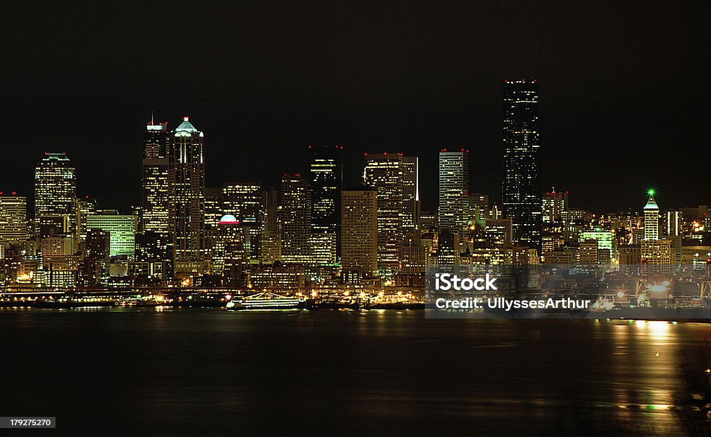 Nightlights of the Puget Sound Seattle Washington cityscape from the puget sound at nighttime Architecture Stock Photo