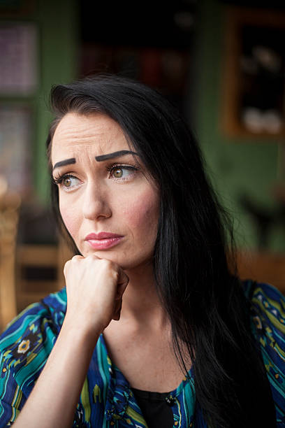 istock Beautiful Young Woman with Pensive Expression 179275362