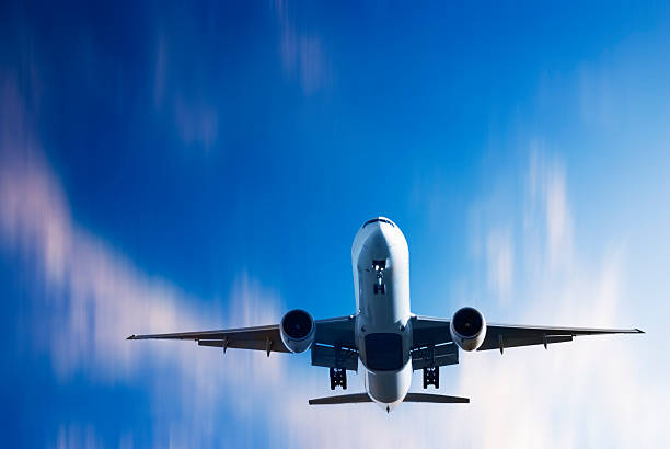 istock Jet Aeroplane Landing From Bright Twilight Motion Blur Sky 179275410