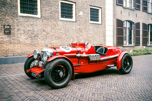Bentley Special old N0 1 MKVI 1947 vintage race car in bright red parked on the street in Zwolle.
