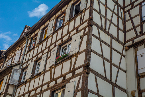 17. 07. 2023 Colmar, Alsace, France, traditional half-timbered houses, and architectural details are tourist attraction.