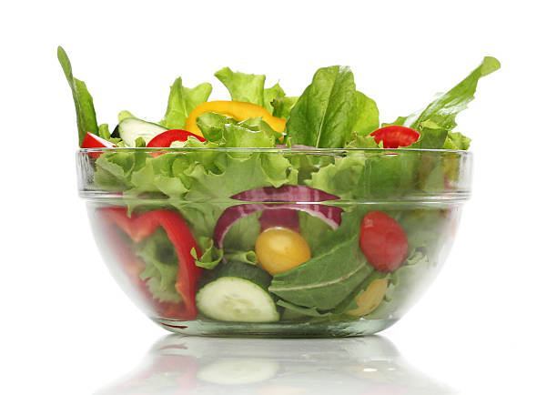 istock Delicious salad on a bowl isolated over white 179275993