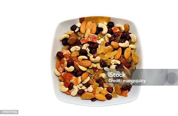 Bowl Of Mixed Sultanas Isolated Stock Photo - Download Image Now - Chestnut - Food, Variation, Nut - Food