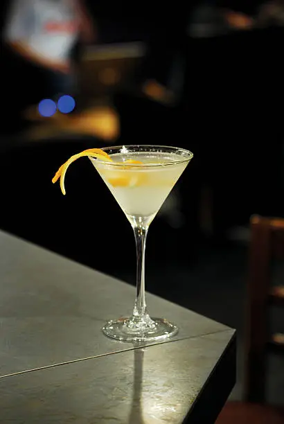"Martini cocktail,Beefeater 24 Gin, Cointreau, elderflower cordial, vanilla syrup and Tio Pepe dry sherry garnished with both lemon and orange zests."