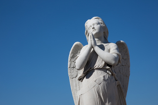 Angel in prayer in Colombus(Colon) Cemetery, Havana.