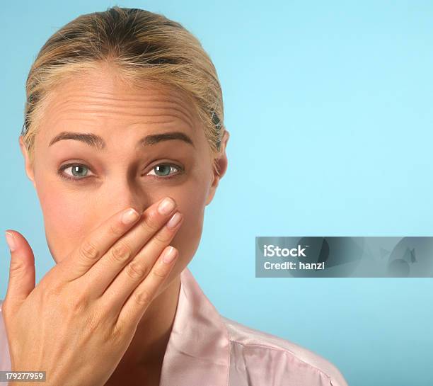 Blonde Woman Covering Nose With Hand While Sneezing Stock Photo - Download Image Now