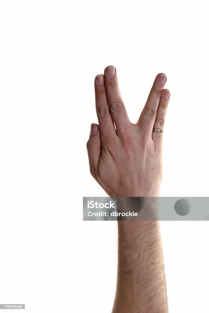Left Hand Doing the Vulcan Greeting "This is a white male right hand making the universal greeting symbol for Vulcans everywhere.  Oh, and he's wearing a Math Grad ring" Gesturing Stock Photo