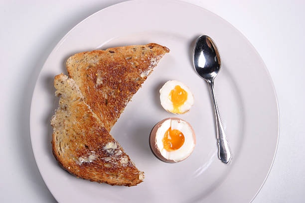 Egg & Toast Boiled Egg & Toasted Granary Bread Toast granary toast stock pictures, royalty-free photos & images