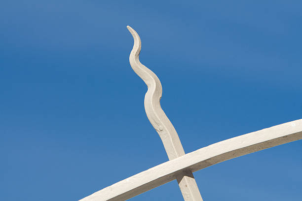 istock Curvy Decorative Wrought Iron Spike From Fence, Isolated Blue Sky 179278701