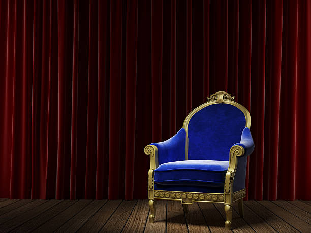 istock blue classic armchair on red curtain 179279402