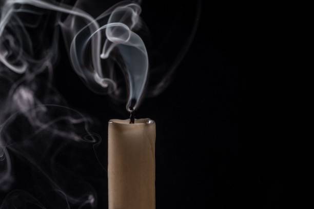 istock Isolated image of a lit cigarette with a thin wisp of smoke curling from the top 1792794202