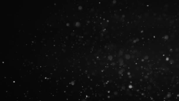 istock Winter night defocused snowflakes snowfall sky 1792800034