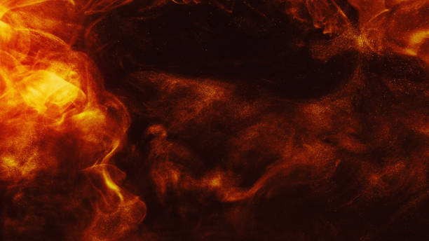 istock Glitter smoke background yellow red fog burst 1792800603