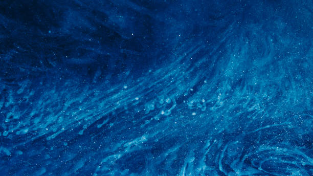 istock Dust particles background glitter sparks blue 1792800614