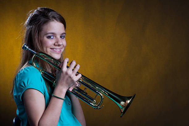 istock Teenage Trumpet Player On Yellow 179281145