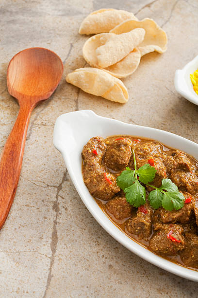 Indian Curry Pork Vindaloo with Poppadums
